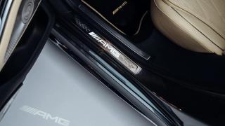 The Mercedes-AMG lettering on a door sill panel.