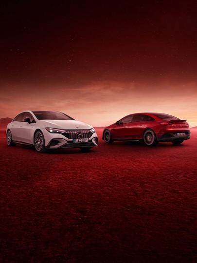 The Mercedes-AMG EQE 43 4MATIC and the Mercedes-AMG EQE 53 4MATIC+ in a galatic scenery.